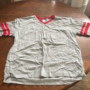 American Apparel grey tee with red accents, size S.